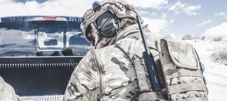 Notional photo of a U.S. military soldier using goTenna Pro mesh networking radio device in the field for off-grid communications