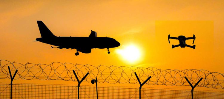 Plane and UAV over bared wire fence